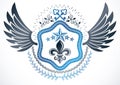 Retro winged vintage Insignia made with vector design elements a Royalty Free Stock Photo