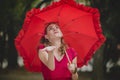 Retro woman checking the rain