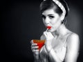 Retro woman drink martini cocktail. Black and white photo.