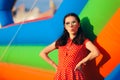 Retro Woman at Garden Party Near Bouncy House Royalty Free Stock Photo