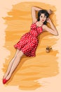 Retro woman laying on beach with liquor holder