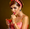 Retro woman with music vinyl record. Pin up girl drink martini cocktail Royalty Free Stock Photo