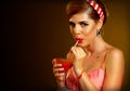 Retro woman with music vinyl record. Pin up girl drink martini cocktail Royalty Free Stock Photo