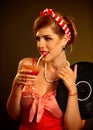 Retro woman with music vinyl record. Pin up girl drink martini cocktail
