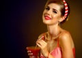 Retro woman with music vinyl record. Pin up girl drink martini cocktail. Royalty Free Stock Photo