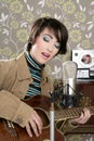 Retro woman musician guitar player vintage Royalty Free Stock Photo