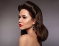 Retro woman portrait. Elegant brunette with red lips makeup and Royalty Free Stock Photo