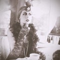 Retro Woman 1920s - 1930s Sitting in the Cafe Royalty Free Stock Photo