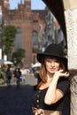 Retro woman on street of old town Gdansk Royalty Free Stock Photo