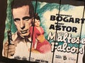 Retro Wooden Board with Maltese Falcon Movie Poster on it Royalty Free Stock Photo