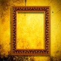 Retro wooden frame over gold grunge wallpaper Royalty Free Stock Photo