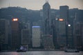 Retro wooden ship or Chinese junk boats for travelers people looking view of Hong Kong and Kowloon island at Victoria Harbour Royalty Free Stock Photo