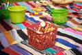 Retro wooden toys in basket on colored rug. Old toys, vintage color style Royalty Free Stock Photo