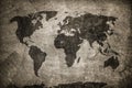 Retro world map on concrete, plaster wall. Vintage, grunge background. Royalty Free Stock Photo