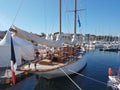 Retro Yacht moored near the pier in a marina of the French maritime city. Boat show in Ciotat. Clear sunny day. Europe. Mediterran Royalty Free Stock Photo