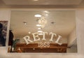Rettl 1868 store interior with elegant decor and logo reflection Royalty Free Stock Photo