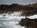 The return of water from a wave through the rocks