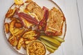 Reuben sandwich. Classic traditional American sandwich. Pastrami and corned beef on grilled bread Royalty Free Stock Photo