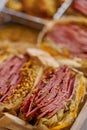 Reuben sandwich. Classic traditional American sandwich. Pastrami and corned beef on grilled bread Royalty Free Stock Photo