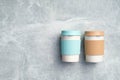 Reusable bamboo coffee cups on stone background. Eco-friendly take away coffee mugs. Zero waste, sustainable lifestyle concept. Royalty Free Stock Photo