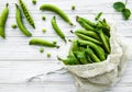 Reusable eco-friendly bag full of fresh  pea pods Royalty Free Stock Photo