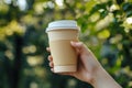 Reusable Eco-Friendly Coffee Cup Held Outdoors Royalty Free Stock Photo