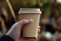 Reusable Eco-Friendly Coffee Cup Held Outdoors Royalty Free Stock Photo