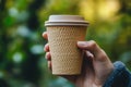 Reusable Eco-Friendly Coffee Cup Held Outdoors Royalty Free Stock Photo