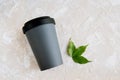 Reusable eco friendly handy bamboo cup on neutral background with copy space. Conscious consumption Royalty Free Stock Photo