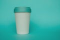 Reusable plastic free eco friendly bamboo cup for take away coffee on light blue background. Royalty Free Stock Photo