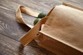 Reusable shopping bag with fresh fruits. Natural eco friendly material. Green avocados, hessian or jute sack on brown wooden table Royalty Free Stock Photo