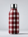 Reusable water bottle with a red and white checkered pattern Royalty Free Stock Photo