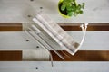 Reusable zero waste straws and linen pouch, close-up view