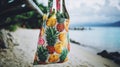 A reusalbe cloth tote bag filled with fruit on a beach. AI generative image.