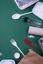 Reuse reduce recycle flat lay concept with plastic, paper, and polyethylene waste. Template image with copy space Royalty Free Stock Photo