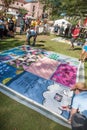 Revealing Section of AIDS Quilt at ceremony