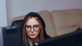 Revealing shot of wanted female hacker using super computer