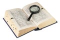 Revealling book with magnifying glass Royalty Free Stock Photo