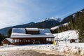 REVELSTOKE, CANADA - MARCH 17, 2021: Revelstoke Nordic Lodge in snow with mountains in background