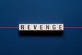 Revenge - word concept on cubes