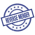 REVERSE MERGER text written on blue vintage round stamp