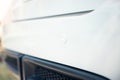 Reverse parking on white car.