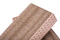 Reversible cat scratcher made of 100% recycled cardboard isolated on white background. Cat Paper Toy for Scratching