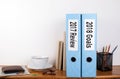2017 review and 2018 goals. Two binders on desk in the office. Business background Royalty Free Stock Photo