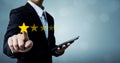Review and rating increase company concept, Businessman hand touching five star Royalty Free Stock Photo