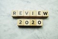 Review 2020 word alphabet letters on marble background