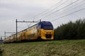 Revised VIRM double deck intercity train on track at Zevenhuizen