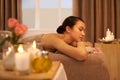 Revive your soul. A beautiful young woman relaxing on a massage table before her massage.