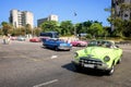 Revolution Square, Havana, Cuba - 30/03/2018: Tourists on retro cars enter the parking