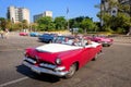 Revolution Square, Havana, Cuba - 30/03/2018: Tourists on retro cars enter the parking